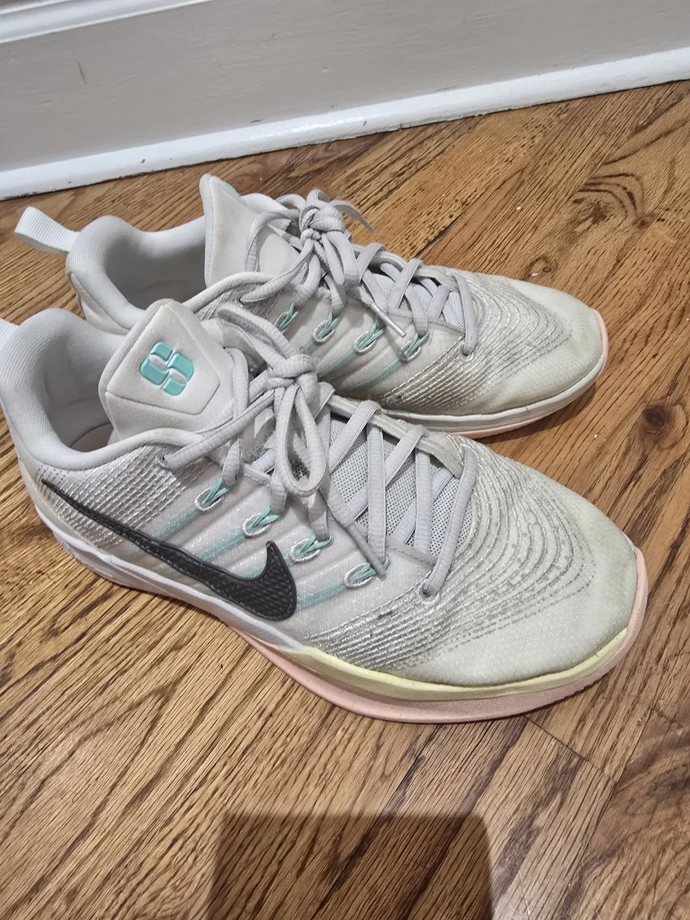 Nike Women's Light Gray Athletic Sneakers with Mint Accents